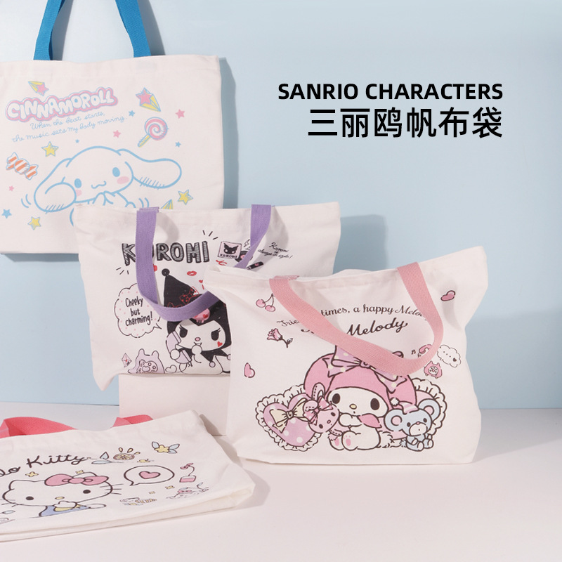 A large capacity canvas bag with a cute design featuring Tomy's Doraemon, Nobita, and Shizuka, perfect for students and storage.