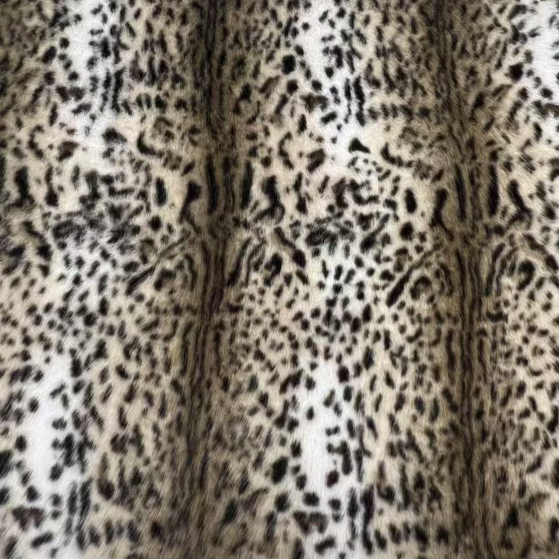 Nuevos productos de tela de impresión de leopardo de zorro dorado imitación de tela de tela de peluche de tela de muñeca de ropa de piel de leopardo