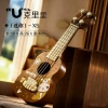 Brown ukulele with a score, with little bears