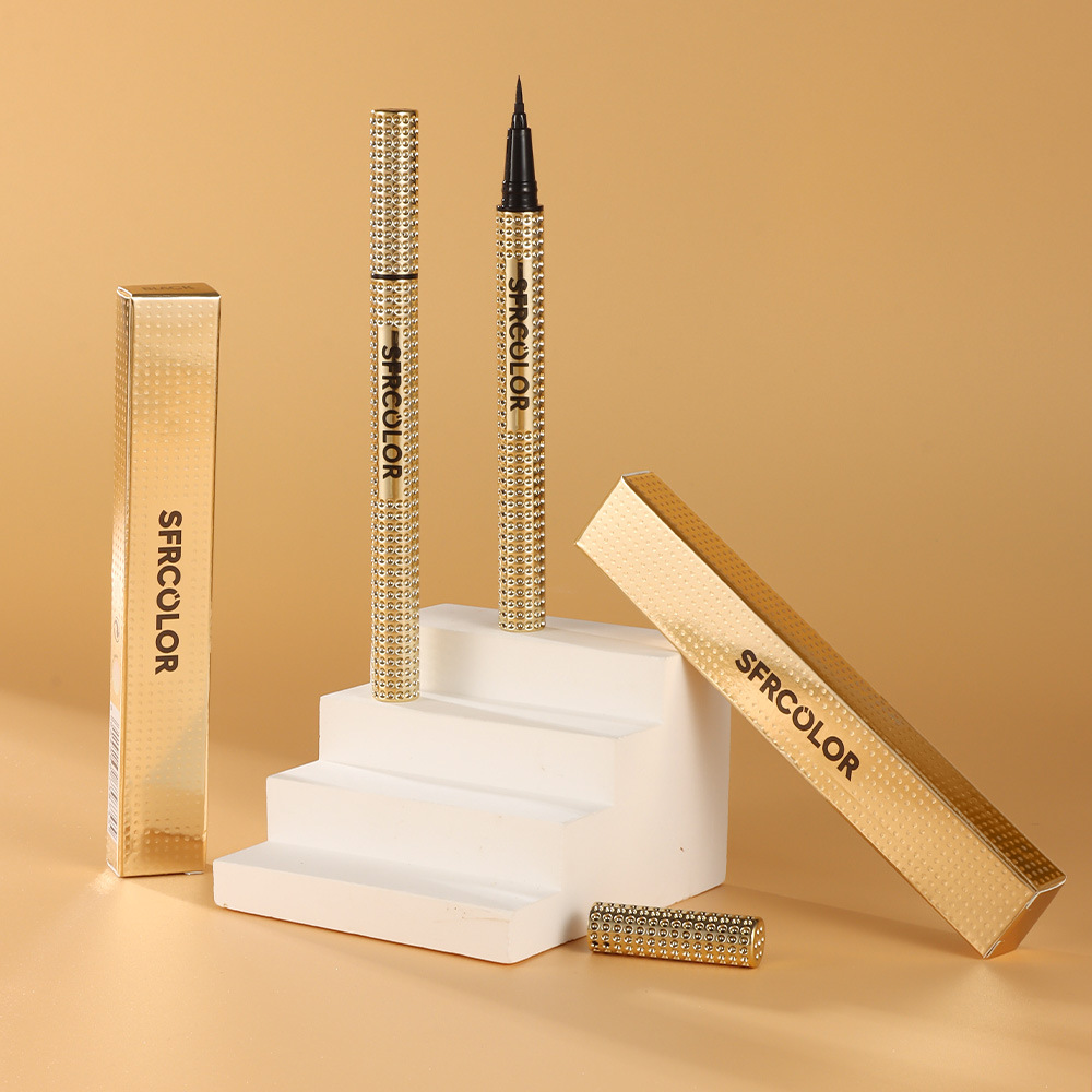 Pequeño tubo de oro resbaladizo rápido seco impermeable resistente al sudor duradero no es fácil de desvanecerse delineador de ojos negro para estudiantes novatos baratos
