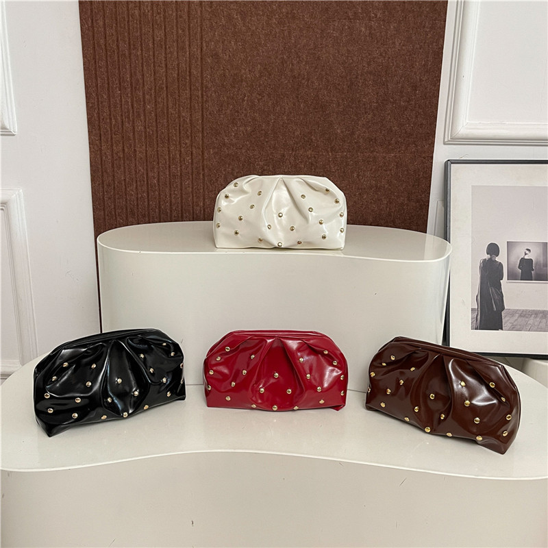 Plegado versátil punto de onda de moda simple bolso de cena de mujer estilo de la República de China retro ocio de alto grado temperamento bolso de mano