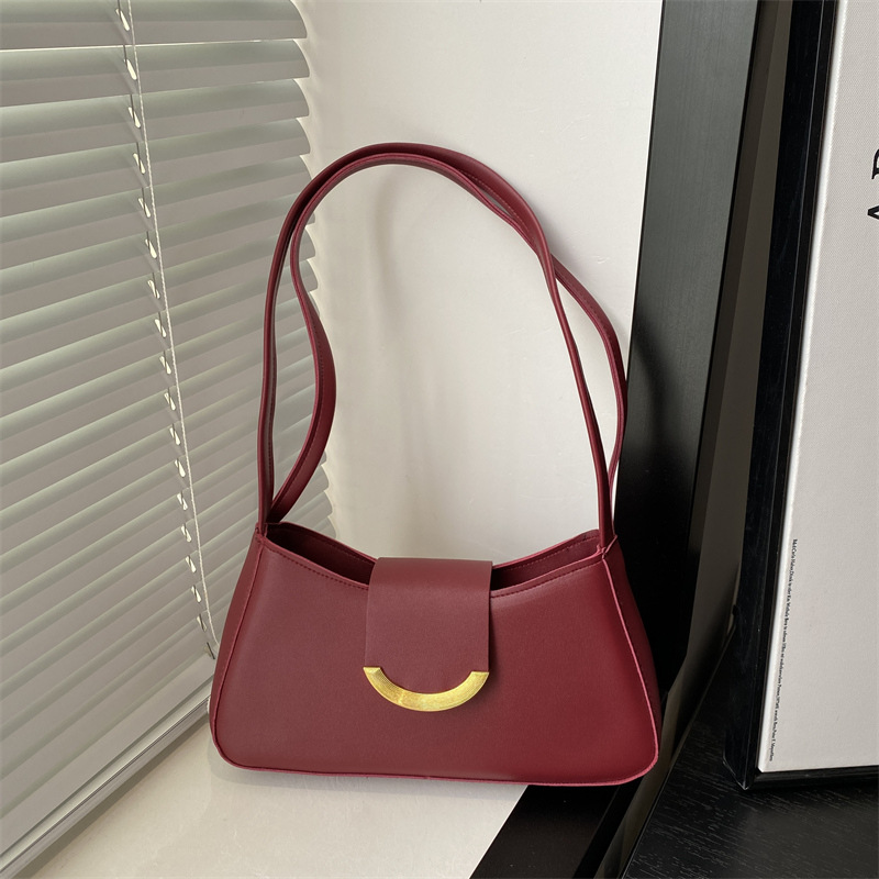 Textura de moda casual bolso bajo 2025, principios de primavera nueva personalidad ins bolso de hombro de aire extranjero, textura de moda bolso de mochila