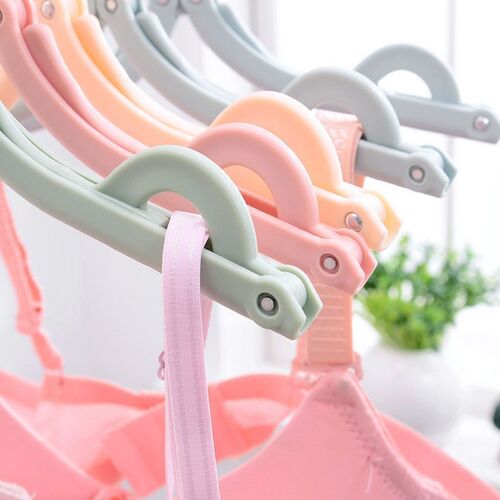 Folding clothes hanger travel multifunctional plastic magic portable home storage simple business trip retractable non-slip drying rack