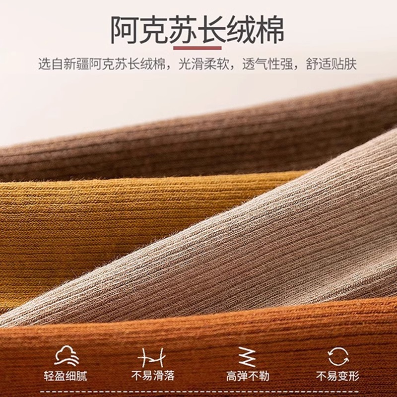 縦条のふくらはぎの靴下の女性の春秋の圧力の長い筒の靴下はやせていることができます。