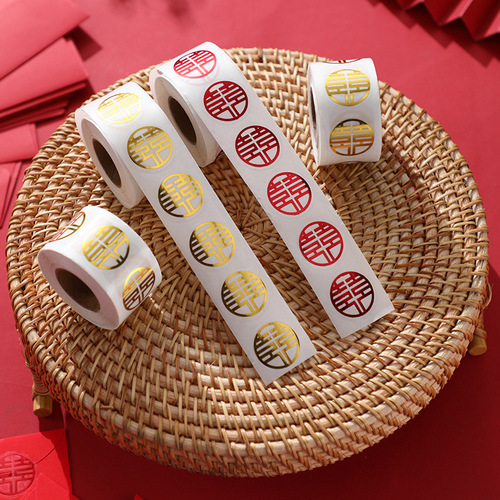 Wedding stickers with happy words on red envelopes and sugar box seals. Small happy words with glue on mini egg and apple cups