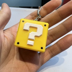 音の疑問符の四角のキーホルダーのペンダントの減圧のおもちゃの日本のユニバーサル映画城のトップの硬貨の音