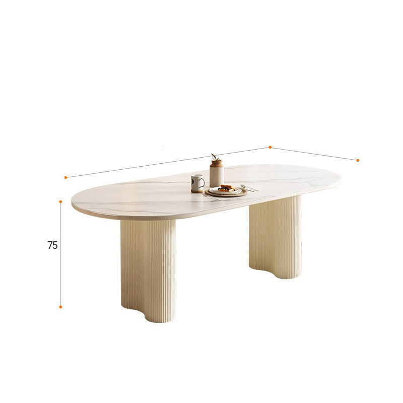 Mesa de comedor ovalada de roca francesa lujosa crema de lujo ligera de alta gama moderna y simple columna de cacahuete silla de viento silencioso combinación de mesa de comedor