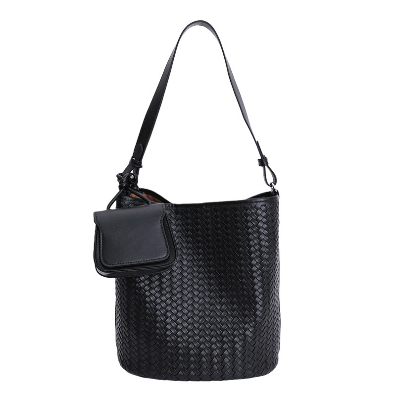 Diseño coreano de nicho de tejido bolso de cubo de agua de mujer nueva textura de alta calidad de hombro versátil bolso de tramo inclinado