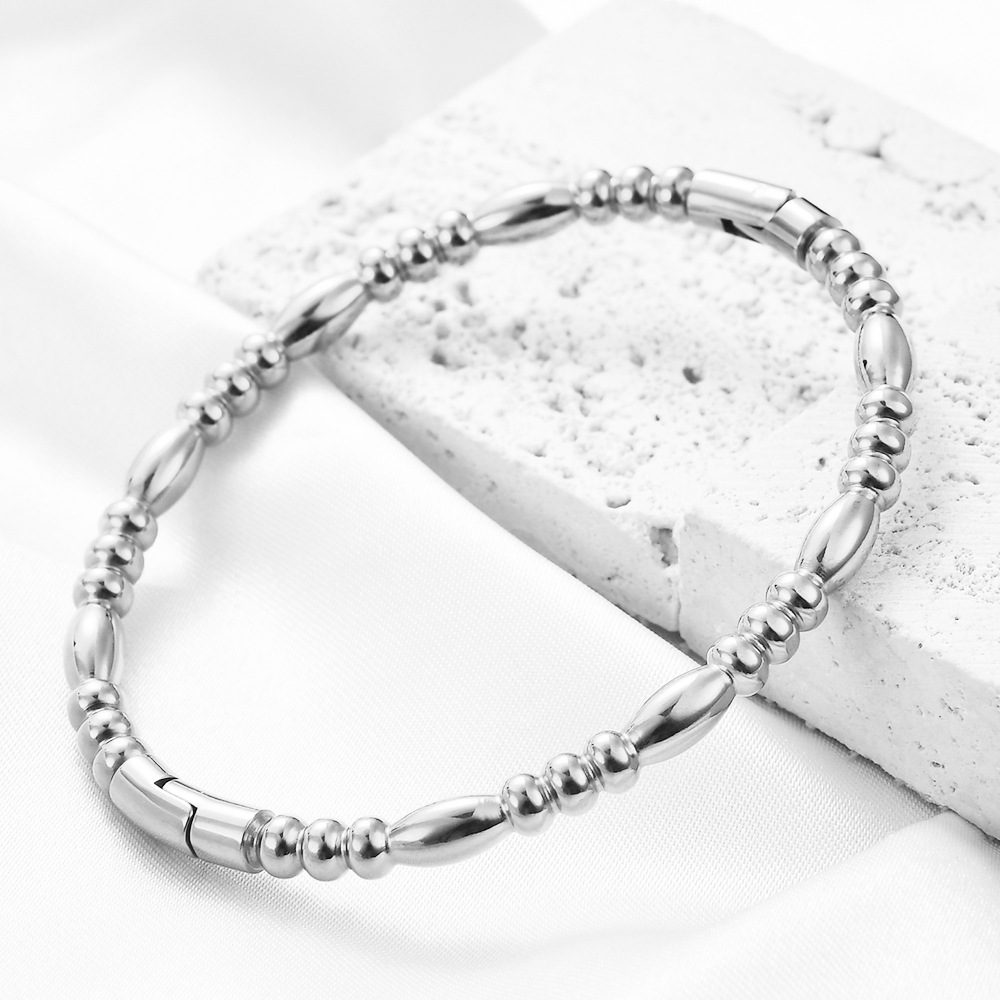 Minimalistisk guldfarvet bambu armbånd i rustfrit stål_voghion.com