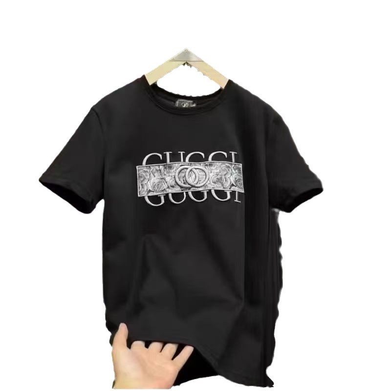 2025夏の対外貿易の新型の重いポンドの純綿の半袖のtシャツの男性の丸首のプリントの潮流のゆったりしている百合の上着