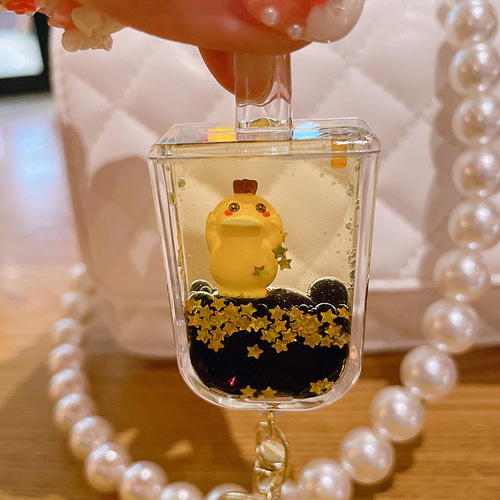 Internet celebrity Kodak Duck key chain filled with oil floating cartoon doll key chain quicksand bottle pendant exquisite gift wholesale