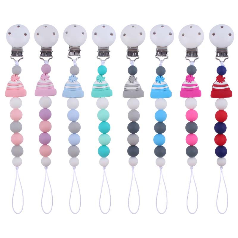 Nuevo bebé suministros chupete cadena bebé creativo de dibujos animados sombrero de Navidad silicona mordida pegamento anti-gota cadena