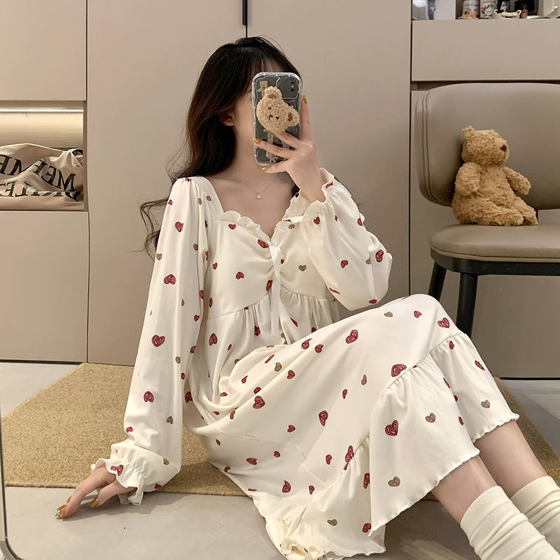 Fábrica directa con cojín de pecho desmontable de ternilla pijama de manga larga primavera y otoño estilo coreano chaqueta dulce ropa larga para el hogar