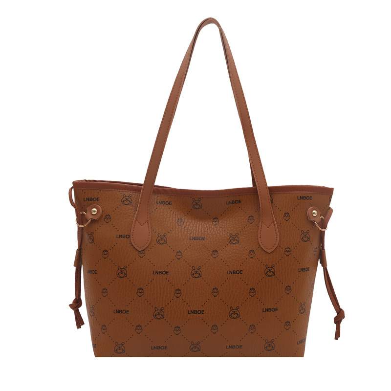 Bolso de mano transfronterizo coreano bolso de mujer otoño 2025 nuevo bolso de hombro de lujo ligero de textura alta bolso de brazo
