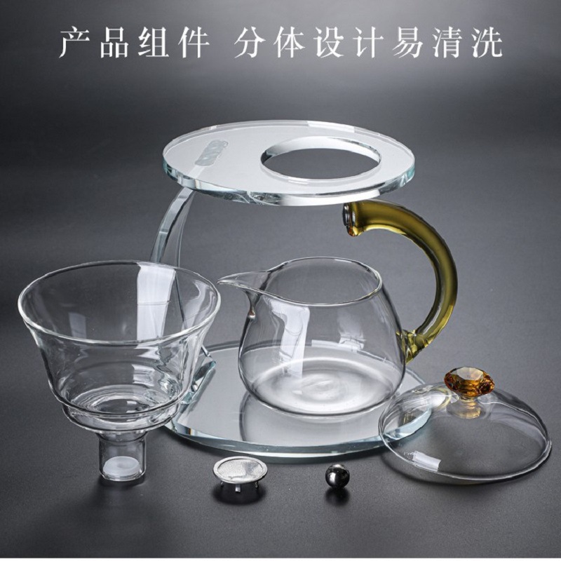 Fábrica al por mayor de vidrio resistente al calor taza de té perezoso traje hogar Kung Fu juego de té engrosada tetera de succión magnética Fabricación de té automática