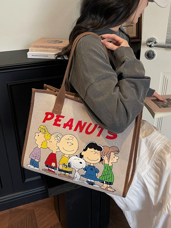 Bolsa de lona para mujeres 2026 nueva versión coreana de gran capacidad de mochila de viaje impresa de dibujos animados bolsas de mano de viaje