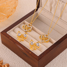 跨境热销爆款饰品气质甜美爱心环绕吊坠项链蝴蝶结耳环钛钢套装