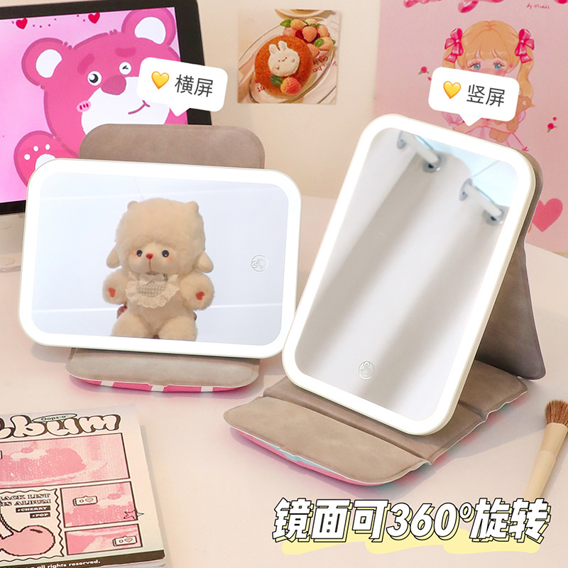 Espejo de maquillaje portátil de escritorio de escritorio para dormitorios de estudiantes domésticos con lámpara de vestir espejo plegable pequeño