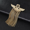 Golden brooch with tassels, trend silver suit, chain, pin