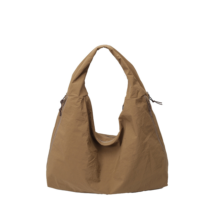 Bolso Tote de nylon popular transfronterizo 2025 verano nuevo estilo ins bolso de mujer de moda súper caliente bolso de viaje de temperamento de moda