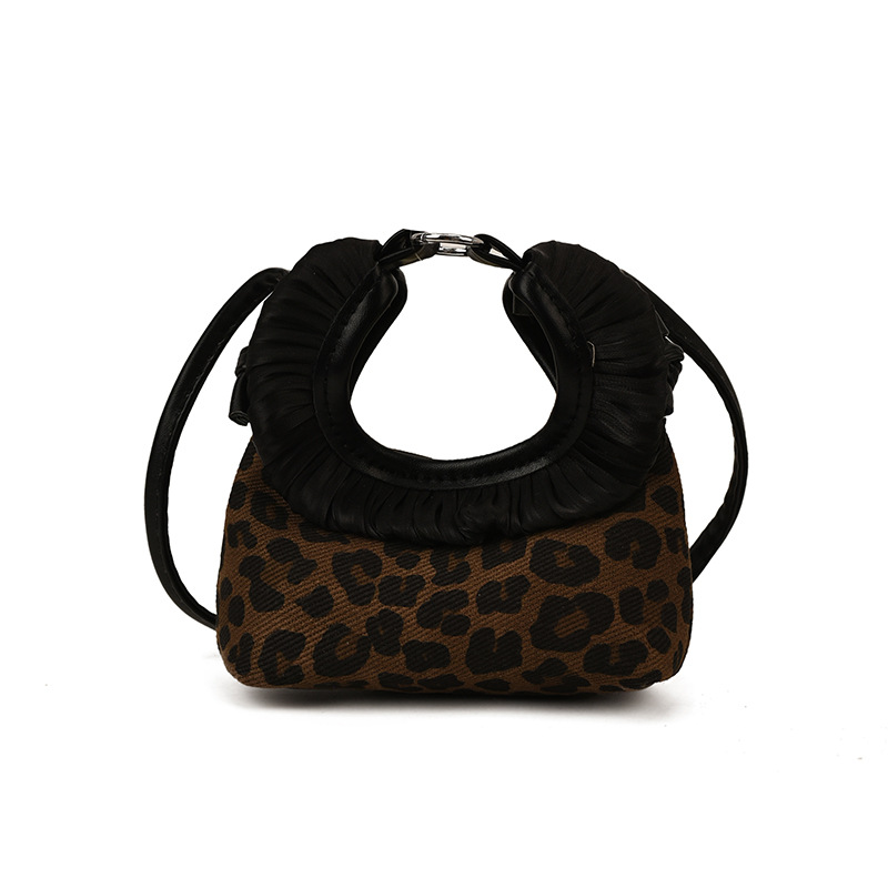 Moda coreana con patrón de leopardo para niñas bolsos de encaje exquisitos mini bolsos de hombro para bebés bolsos de comercio exterior transfronterizos para niños