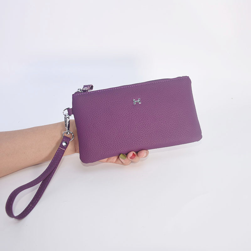 真皮荔枝纹手拿包女时尚简约气质手抓包小众设计字母长款手拿钱包