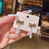 Silver needle, long fashionable earrings with bow, silver 925 sample, Korean style, diamond encrusted, internet celebrity, city style, simple and elegant design