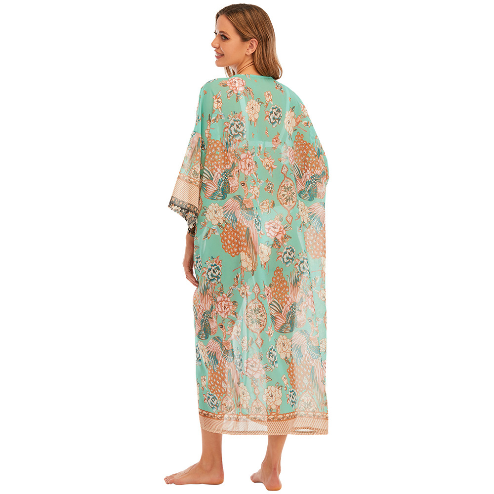 Playa blusa europea y americana gasa impreso vacaciones cardigan playa falda bikini protección solar traje de baño fuera XF59