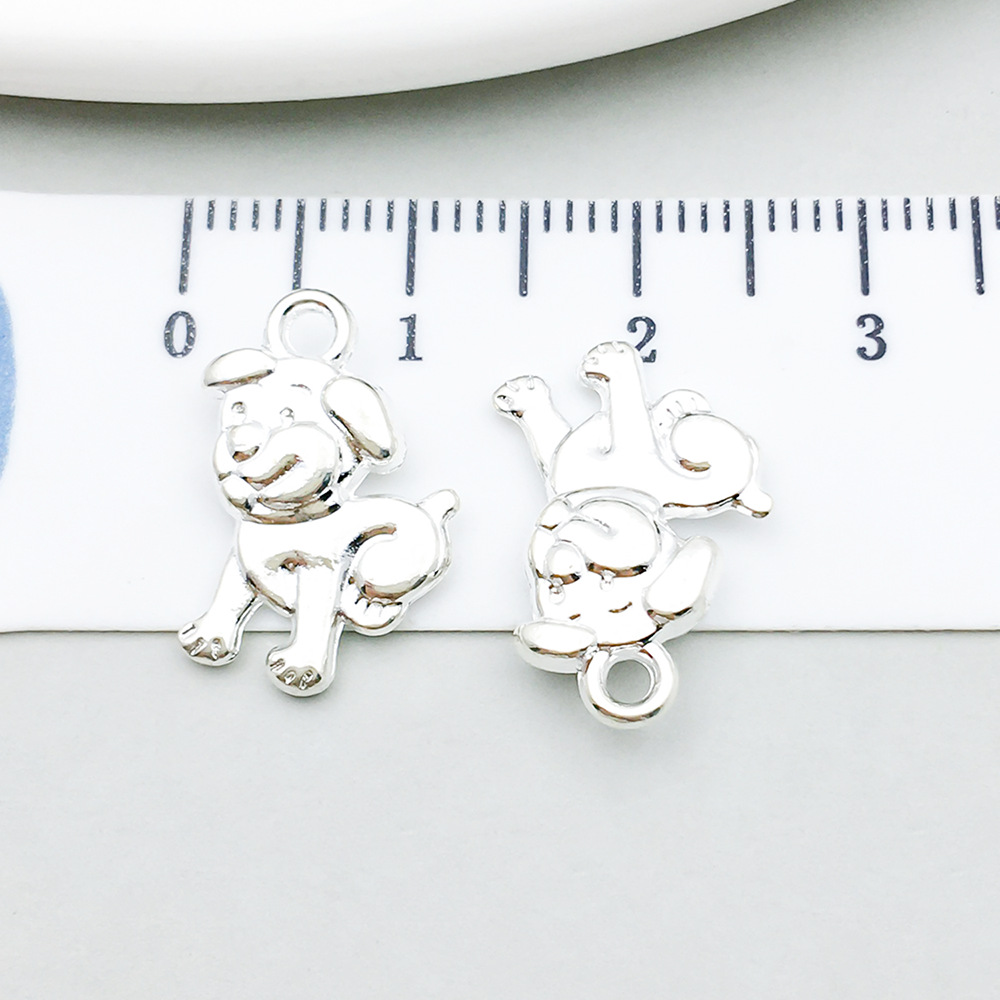 밝은 은색 웃는 개-1.2g-17*11mm-20548 1개