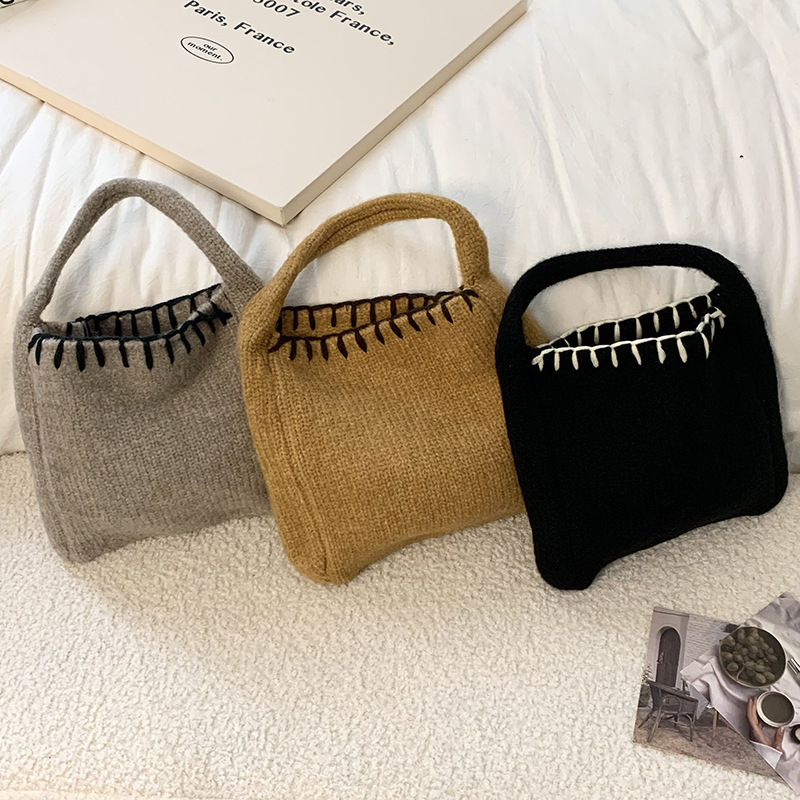 Nuevo bolso de tejido de otoño y invierno atmósfera sensación de bolsa de cesta de verduras bolso de tejido a mano bolso de lana de moda bolso de hombro