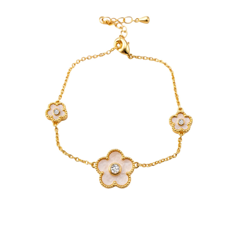 Collar de orejas de piedra de oro real, collar de orejas de flores de lujo ligero, collar de clavícula de nicho, conjunto de joyas simples y dulces.