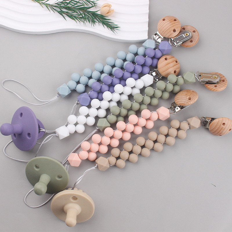 Productos para bebés Clip de chupete de madera de haya Cuentas de colores de dibujos animados para bebés creativos Morderse los dientes Cadena de chupete anti-caída