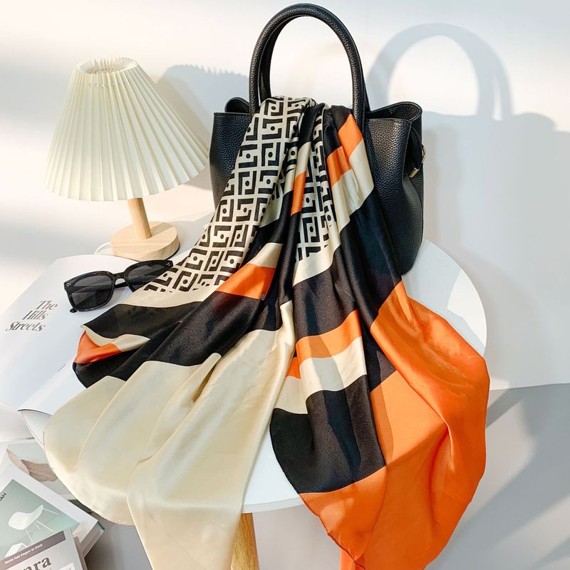 European and American fashion geometric letters contrast color printing silk scarf brocade satin long scarf travel vacation air conditioning shawl