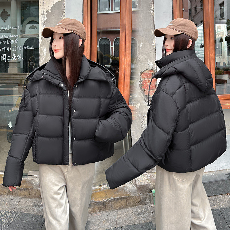 2025 nuevo encapuchado grueso corto de moda de algodón de invierno mujer pequeña chaqueta de algodón de pan caliente