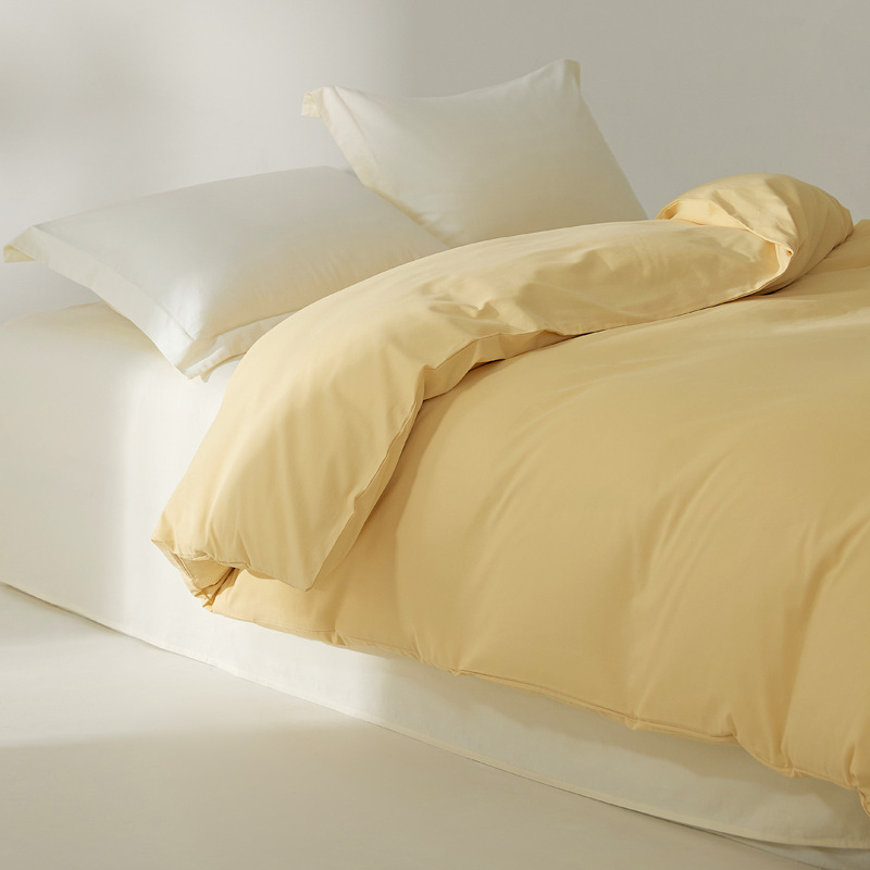 100本の純綿の毛磨き布団は秋冬に厚くて純色がシンプルです。