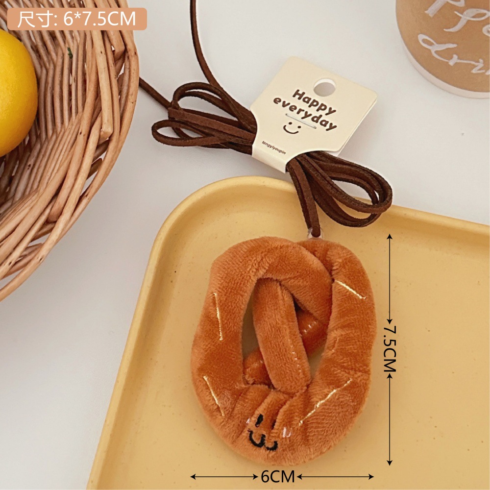 Divertido pan de peluche colgante muñeca lindo extraño mochila colgante de coche accesorios de muñeca al por mayor