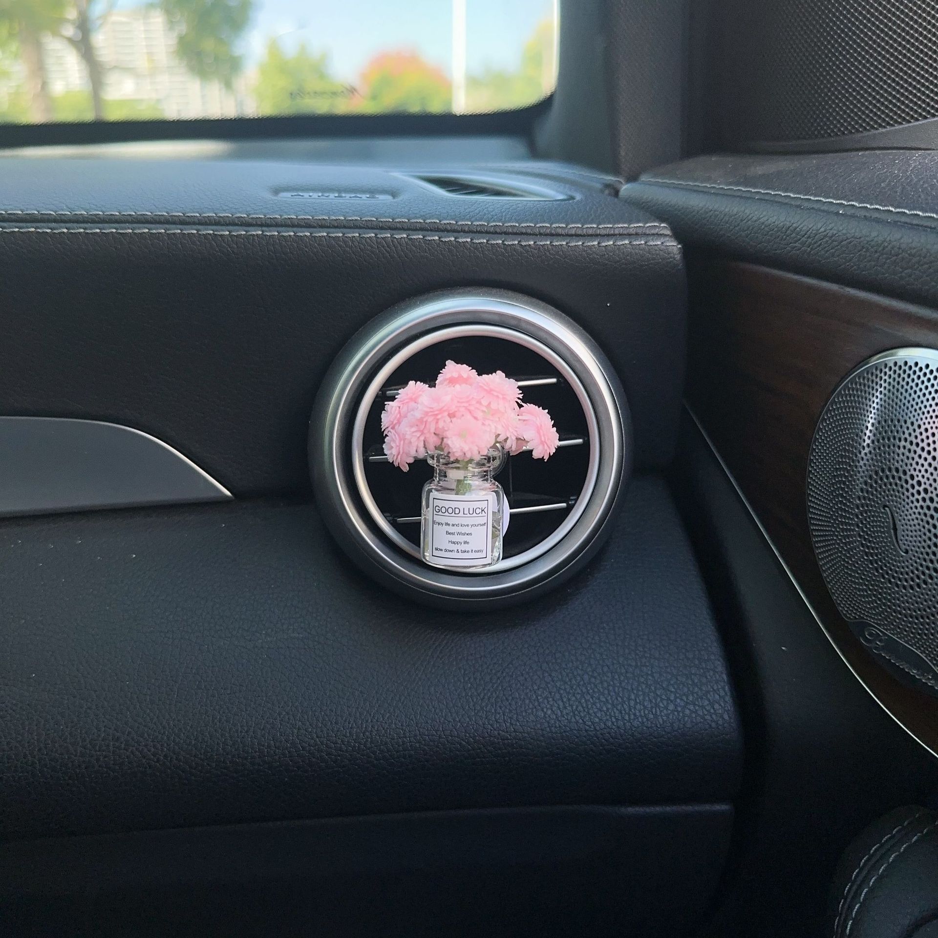 Decoración creativa de salida de aire del automóvil con flores de estrellas pequeñas frescas aire acondicionado botella de perfume de perfumes