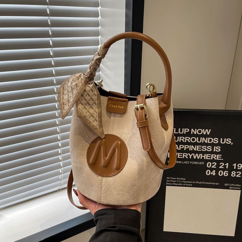 女性のためのハイエンドの人気のバケットバッグ 2025 新しいショルダーバッグクロスボディバッグファッションレトロハンドヘルドレディースバッグ|undefined