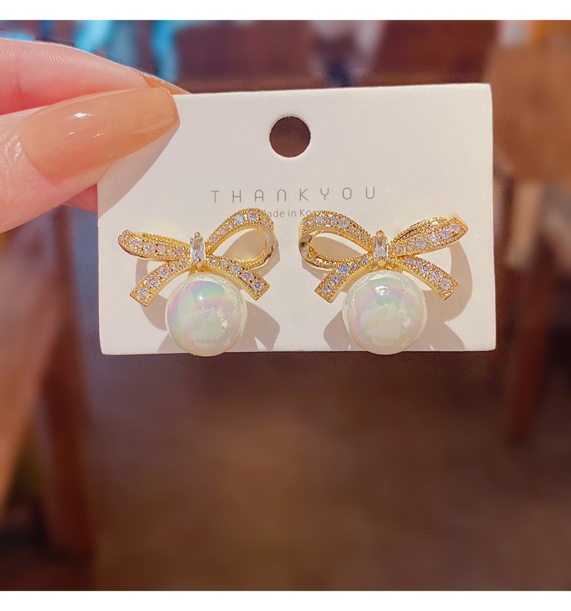 Exquisite Delicate Mermaid Pearl Inlaid Butterfly Bow Earrings display picture 5