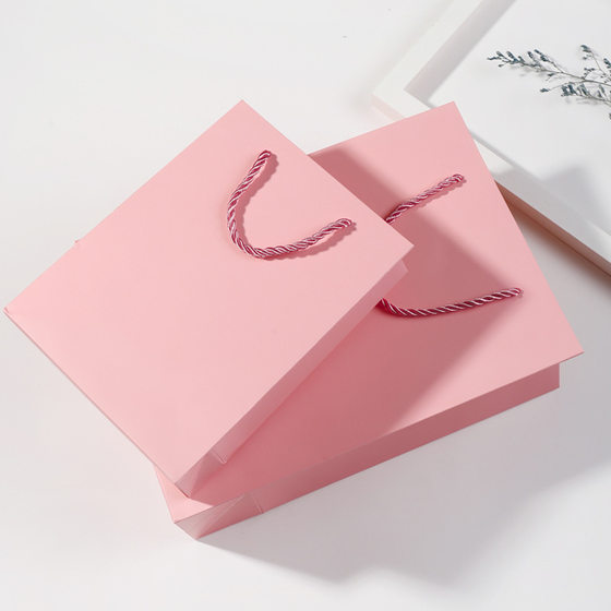 White cardboard handbag gift bag Kraft paper food clothing hand bag jewelry wrapping paper bag wholesale
