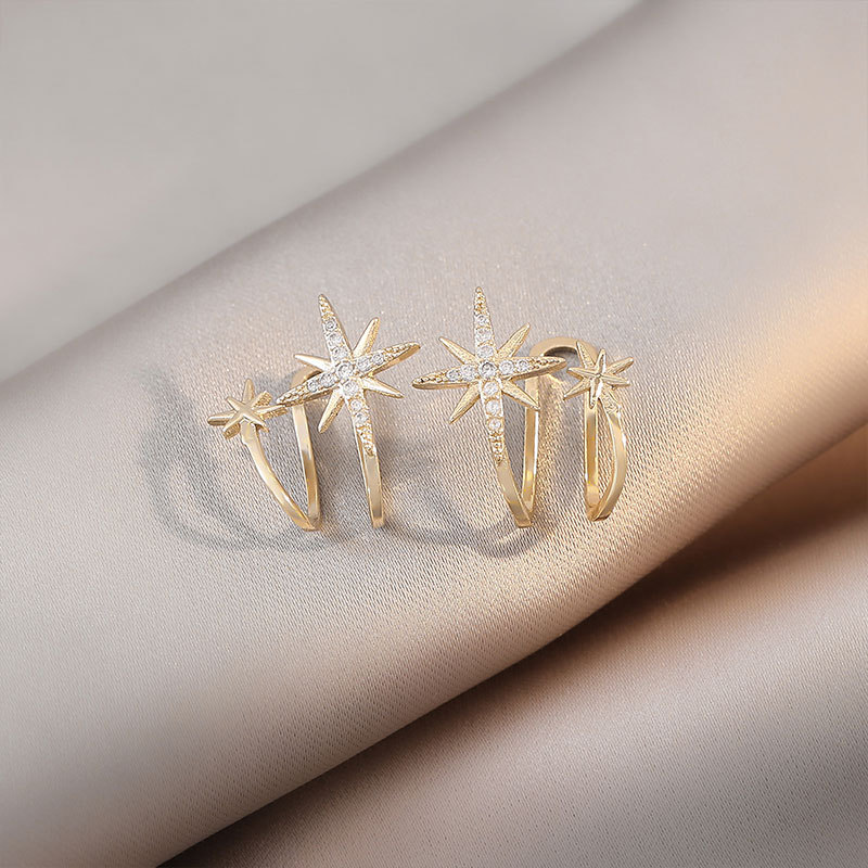 Estrella de seis puntas clip de hueso de oreja hembra de alto grado de luz de lujo único nicho diseño clip de oreja estilo frío pendientes sin oreja