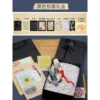 A big newspaper + black surprise gift box