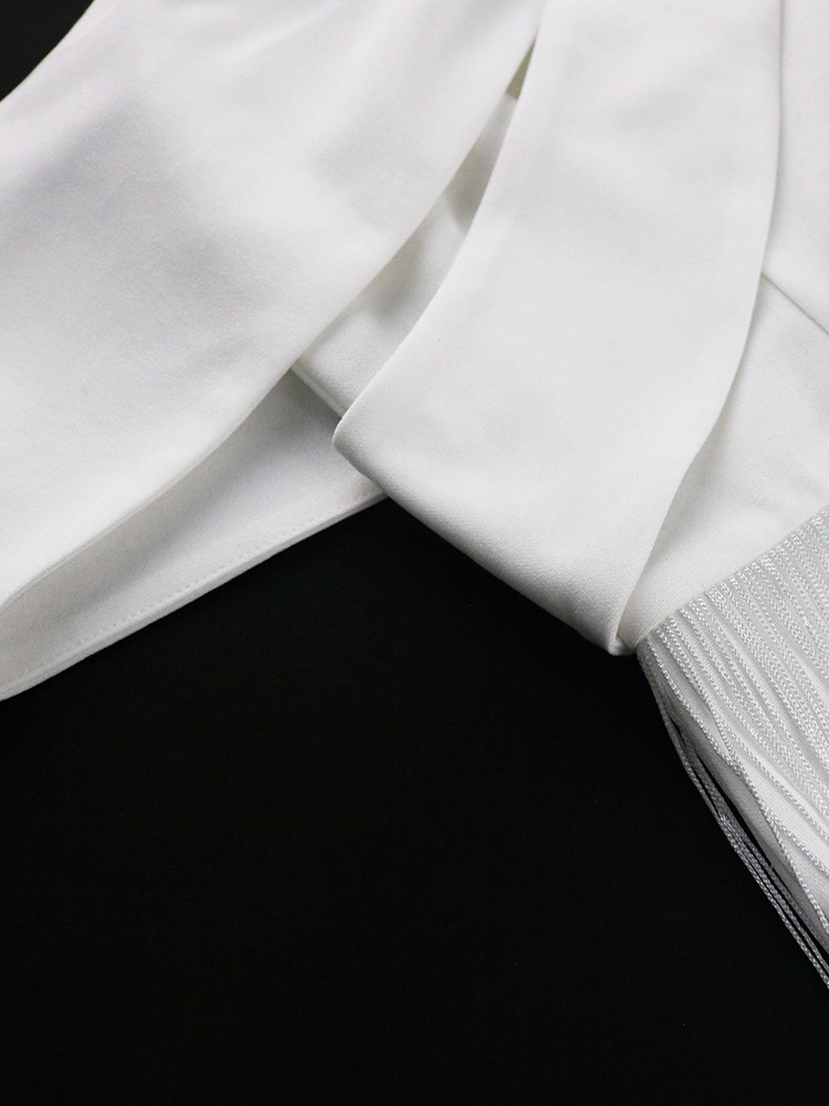 Ženska oblačila seksi cevasto krilo z odprtim hrbtom in resicami, elegantno krilo velike velikosti, obleka_voghion.com