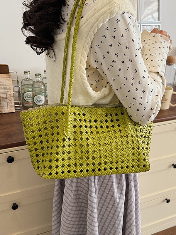 Bolsa de hombro de tejido hueco para mujeres 2026 nueva moda coreana transfronteriza bolso de madre y bebé bolso de lujo ligero