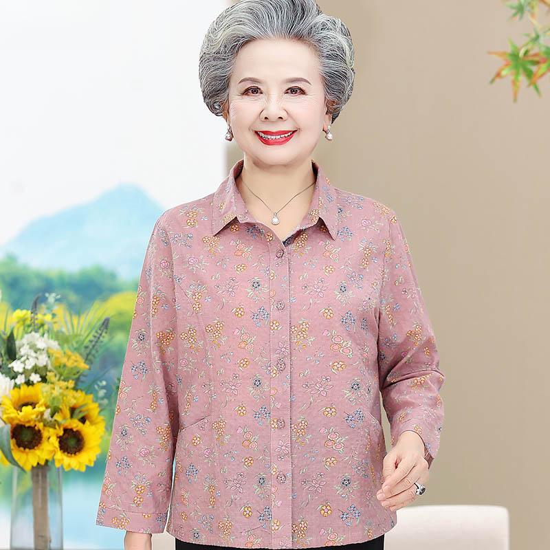 おばあさんは春と秋の純綿の長袖のシャツの中でお年寄りの秋の服の女性の洋風のお母さんの薄いコートのおばあさんの服を詰めます。|undefined