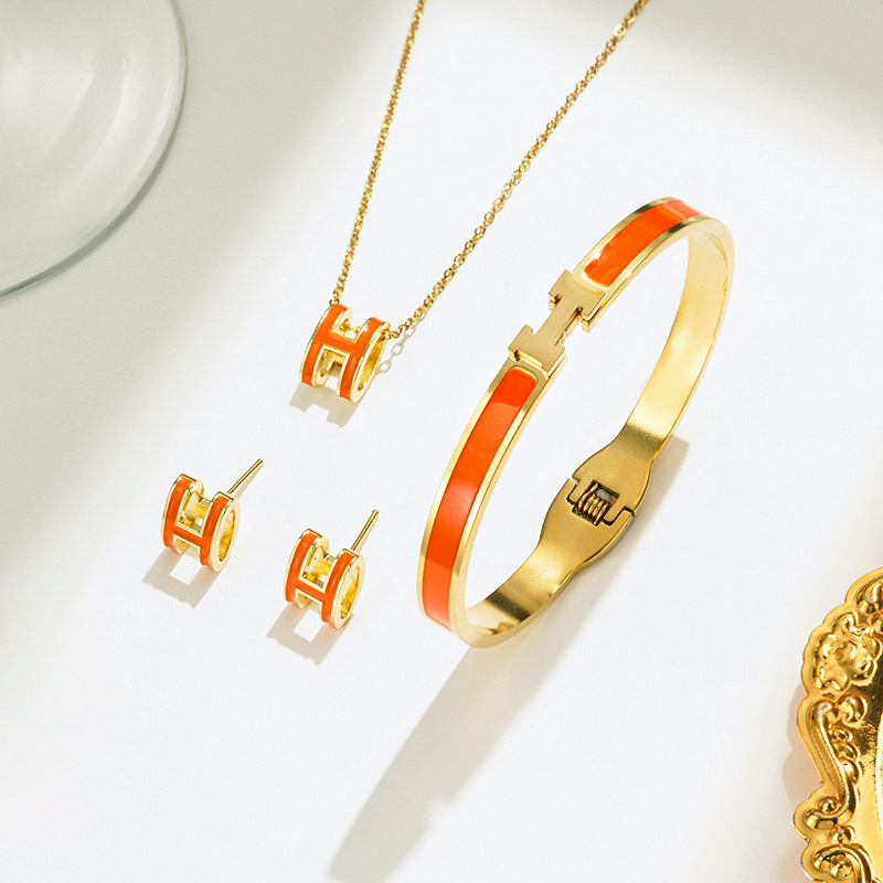 Gold orange necklace stud earrings bracelet