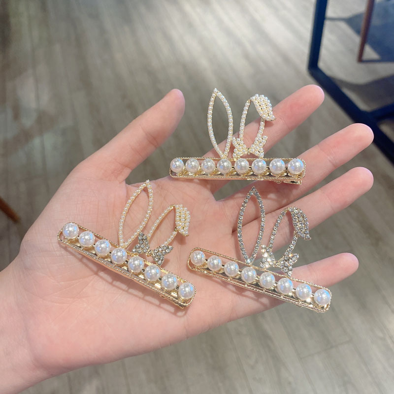 Wholesale Jewelry Imitation Pearl Rhinestone Rabbit Ear Korean Style Hairpin Nihaojewelry display picture 5