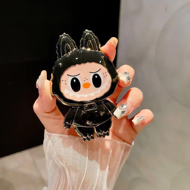 漫画かわいいラブブ携帯電話ホルダーラブブ化粧鏡ホルダーミラー携帯電話ホルダーは回転して折りたたむことができます|undefined