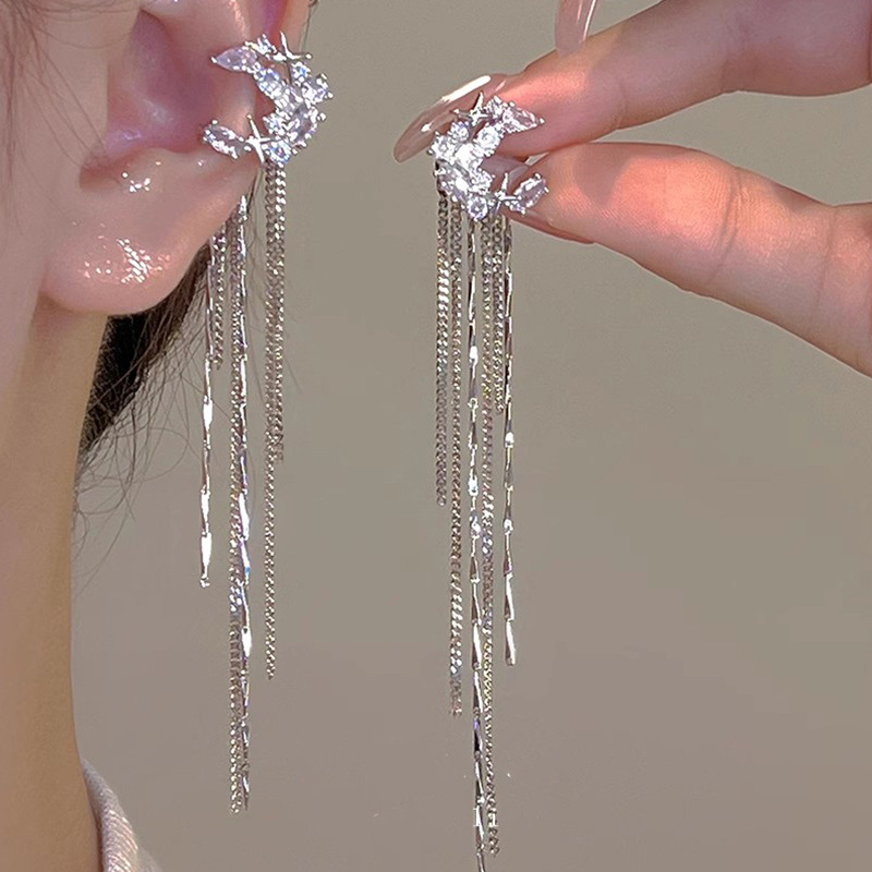 Diseño de nicho de alta gama borla larga sin orejas clip de oreja elegante estilo occidental de las mujeres cara-mirando pequeños nuevos pendientes de moda