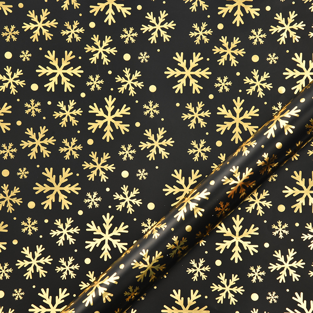 Nuevo papel de embalaje de Navidad estampado retro oro negro alce copo de nieve regalos de árbol de Navidad papel de regalo al por mayor